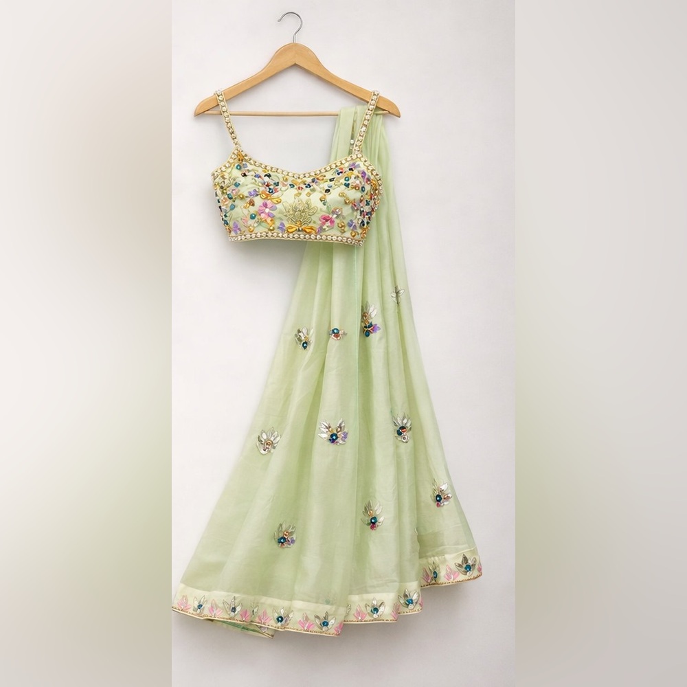 Elegant Pastel Green Embroidered Lehenga with Matching Blouse